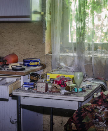Clutter in a kitchen of an abandoned house